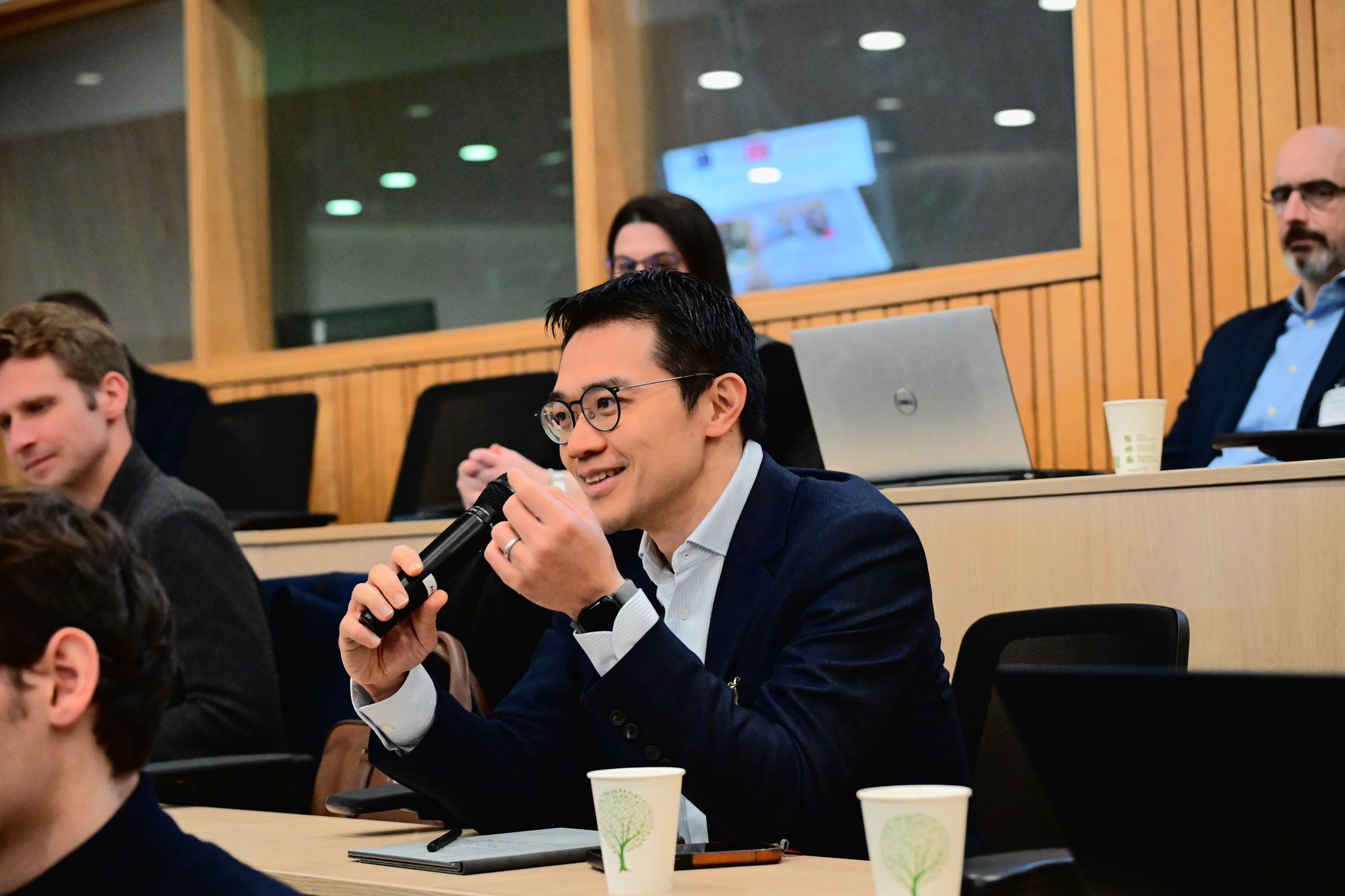 Chengwei Liu speaking at an academic event